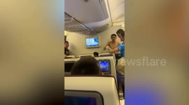 Dehydrated plane passengers collapse as air-con fails before fire