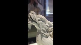 Porcelain sculpture of dragon boat