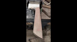 Oiling up the wooden handle of my freshly finished chefs knife.