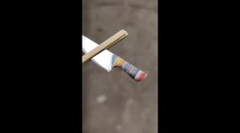 Oiling up the handle of my very tiny knife. The handle is made of old skateboards