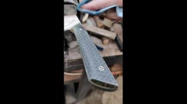 Oiling up the green honeycomb handle of my freshly finished chefs knife.