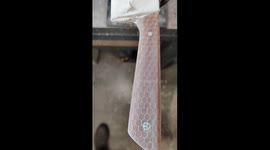 Oiling up the yellow honeycomb handle of my freshly finished chefs knife.