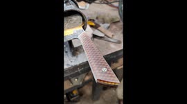 Oiling up the yellow honeycomb handle of my freshly finished chefs knife.