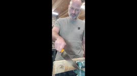 Sharpness test of my handmade kitchen knife on a rough piece of palletwood