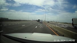 Huge piece of wood flies from truck and crashes into car behind