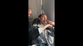 Girl Has a Panic Attack On An Airplane