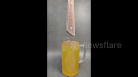 Newsflare Edit - Dipping the honeycomb handle of my freshly made knife in Tung oil.
