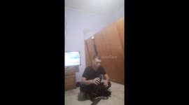Falling cabinet doors strike seated individual in La Plata, Argentina
