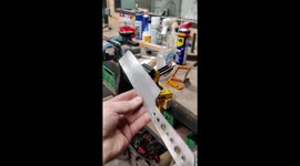 Scribing the centerline of a handmade kitchen knife made from stainless steel