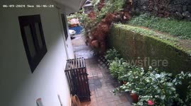Wall collapses just seconds after student walks past in India