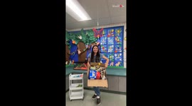 Class teacher stocks a snack cart for little learners
