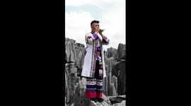 Chinese musician plays tunes with leaves