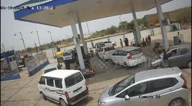 Dramatic footage from CNG petrol pump shows driver rams his car into a woman and youth standing at petrol station
