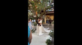 Bride chooses pup over bouquet in heartwarming aisle walk