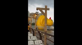 Giant inflatable duck takes flight in Vietnam amidst strong winds