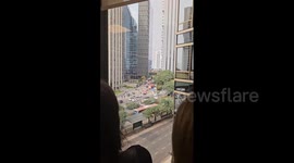 Polish daredevil scales 30-floor tower in Buenos Aires without any safety gear