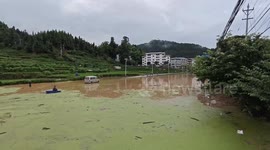 China: Flood Hits Qiandognnan
