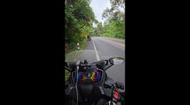 Motorcyclist topples into ditch when he tries to lean against post