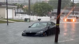 Vehicle Trapped In Flooding
