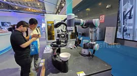 China: Visitors Visit The Industrial Robot Exhibition Area at The 10th China (Shanghai) International Technology Fair