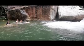 Brave trio saves couple from drowning at southern China waterfall