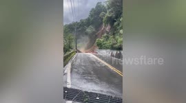 Dramatic landslide blocks narrow road in Taiwan