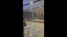 Storm in China amusingly blows parcel through open door