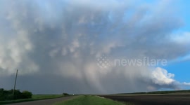 Storm chaser captures stunning supercell's dramatic descent lightning show