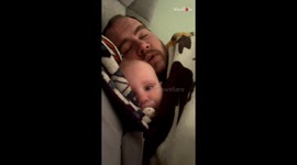 Woman films husband singing a pirate shanty to help baby fall asleep