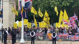 “Not my king!” “God save the King!” Anti-monarchy protesters and royal supporters try to drown each other out during Trooping the Colour