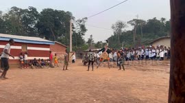 Incredible Stilt Dancers twirling at a ceremony in the Ivory Coast