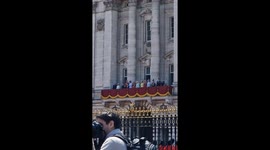 Crowd sings the National Anthem in the Mall as Royal Family appear on the Buckingham Palace balcony