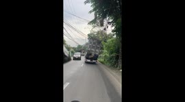 Broken down lorry carried on the back of truck