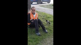 Crow and man share a moment in Kemerovo