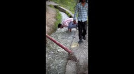 Daredevil handstand fail in Jammu stream