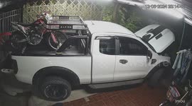 Driver rushes to stop pickup truck from rolling away without handbrake