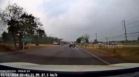 Huge piece of wood comes loose and flies into car behind