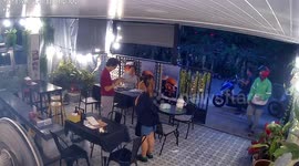 Monitor lizard visiting shop frightens woman