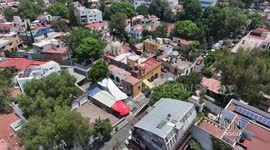 Mexico: Residents in Mexico City retrieve rainwater to mitigate water scarcity