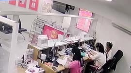 Sssstick them up! Snake sparks panic when it slithers into bank
