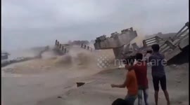 Bridge collapses in floodwater just months after its construction in northern India