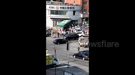Bus swerving to avoid car smashes into bank in northern China