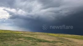 Storm clouds loom over Wall, South Dakota