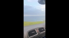 Cows take over road to Ballycastle Beach, UK