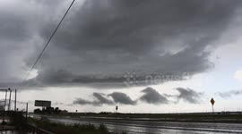 Wave-like cloud formation appears below a supercell thunderstorm in Texas