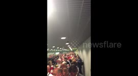 DUPLICATE Thousands of Liverpool fans queue up at passport control in Basel