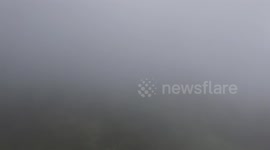Drone to the top of the fog