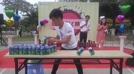 A student 1 minutes to balance 24 Soda Can