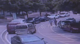 Minibus slides down hill and damages three cars