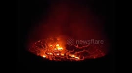 Glowing lava lake at Nyiragongo volcano in DRC